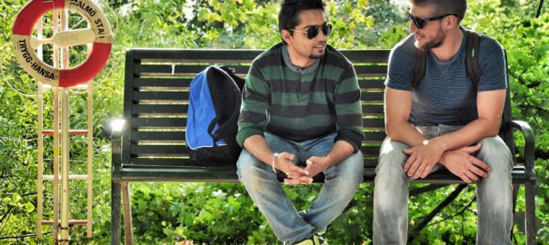 Two kids on a bench